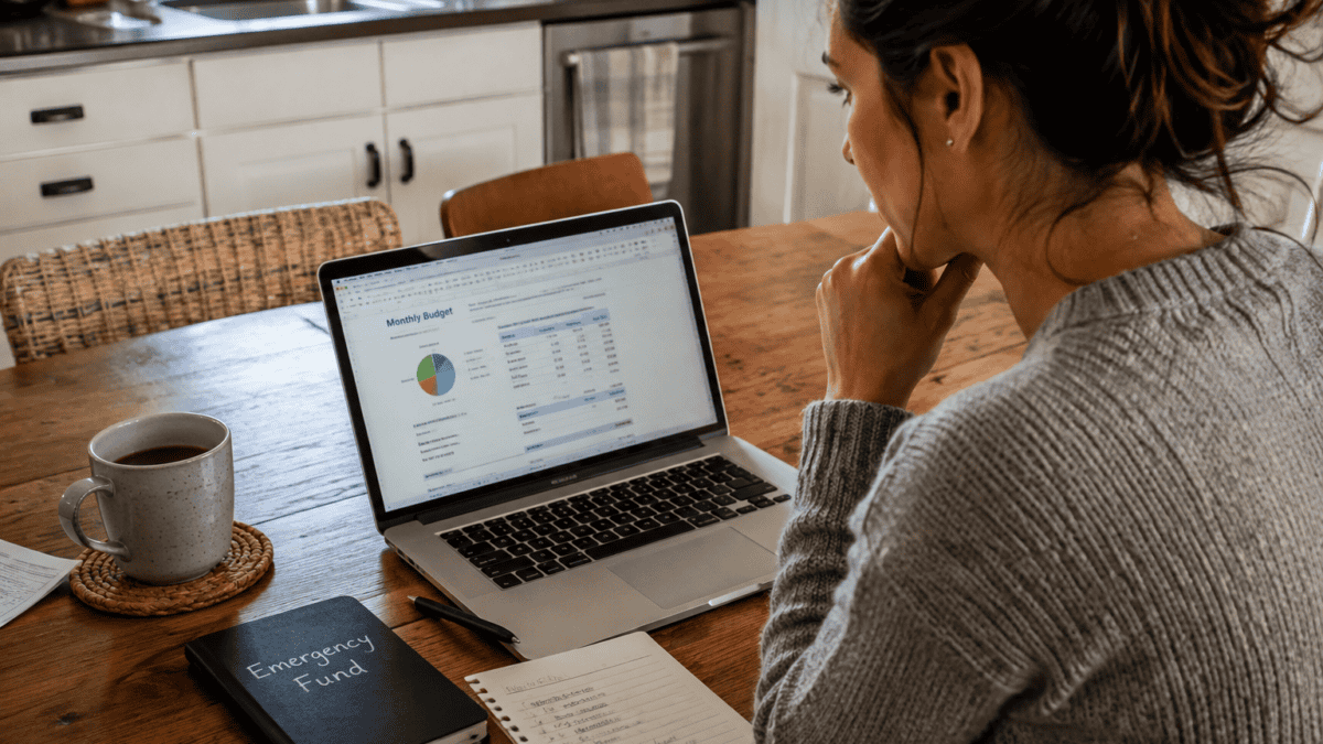 Person reviewing their emergency fund savings plan at home